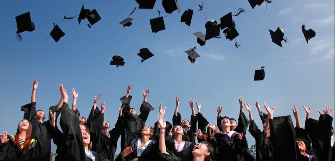 Graduation Hats in the air small